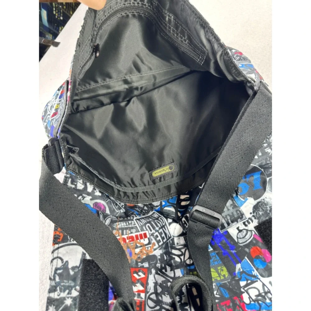 LeSportsac Graffiti Sticker Bomb Messenger Bag Black Multi Ripstop Crossbody